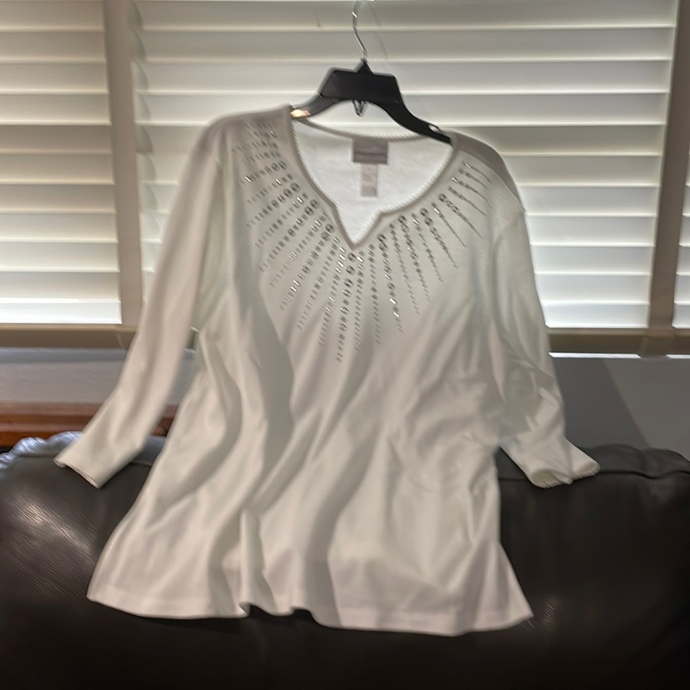 White blouse with silver blink at the top